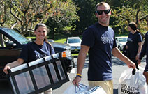 Photo of students moving in. Link to Gifts That Pay You Income.